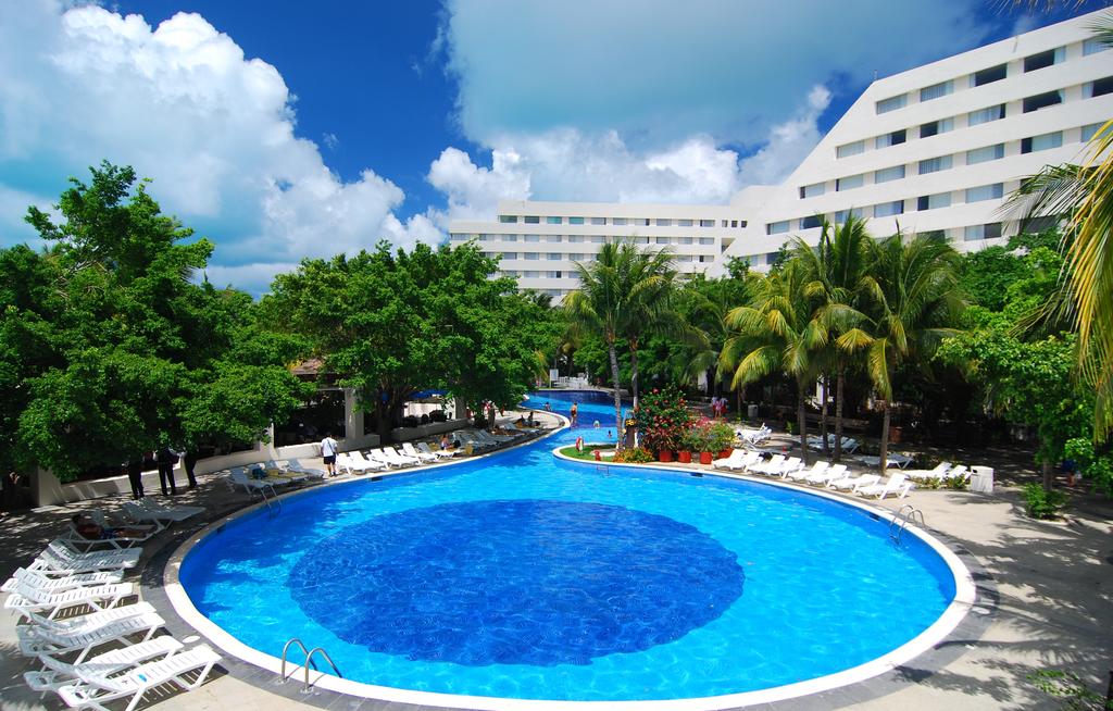 Отель Oasis Palm 4*, Канкун - фото 1